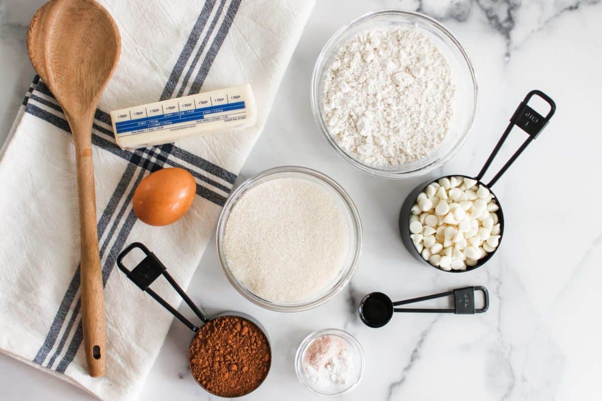 Baking ingredients neatly arranged on a surface, ready to be used for cookie making.