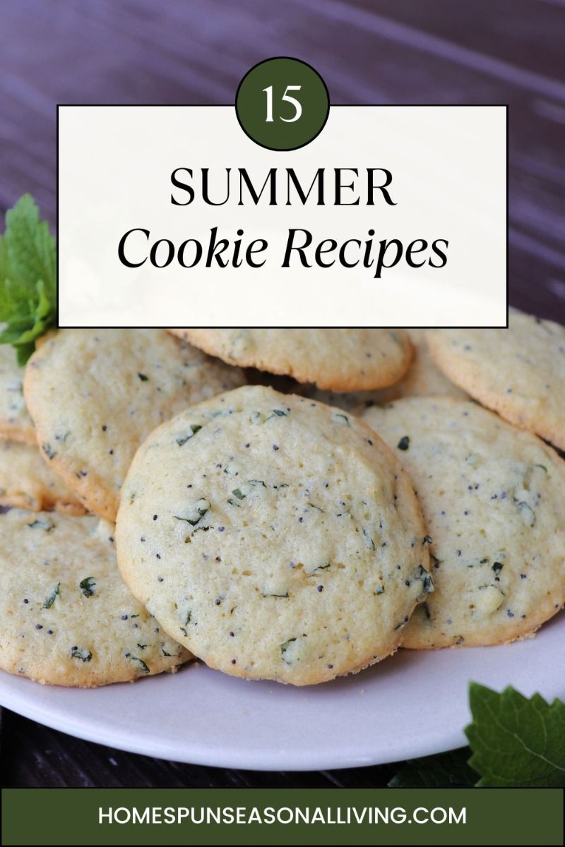 Plate of round, light-colored cookies with small dark speckles and green herb pieces.