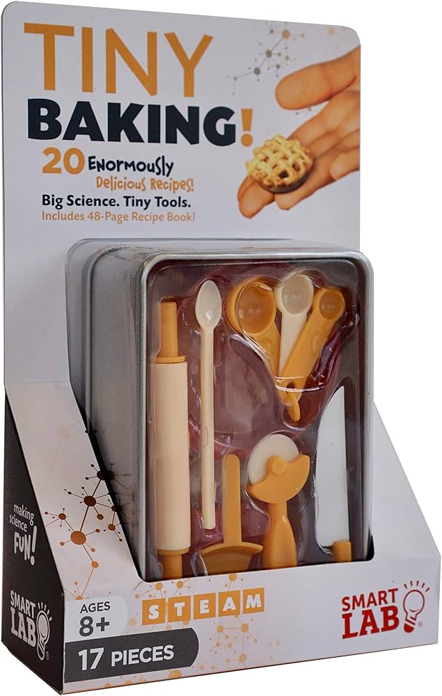 Tiny baking kit with miniature baking tools and recipe book