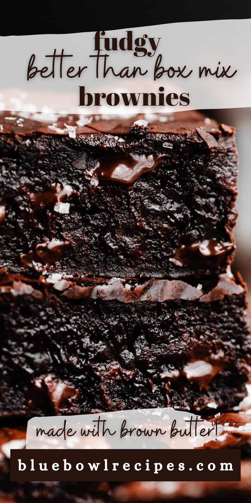 Close-up of stacked brownies with visible melted chocolate and sea salt flakes