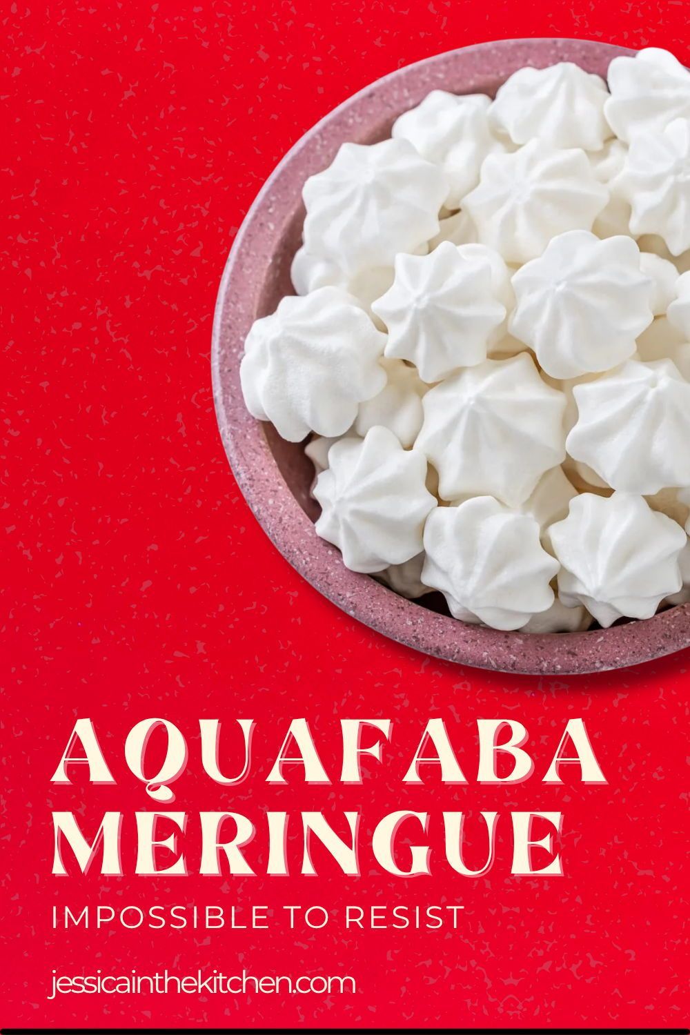 A bowl filled with small, white aquafaba meringues, piped into star shapes.