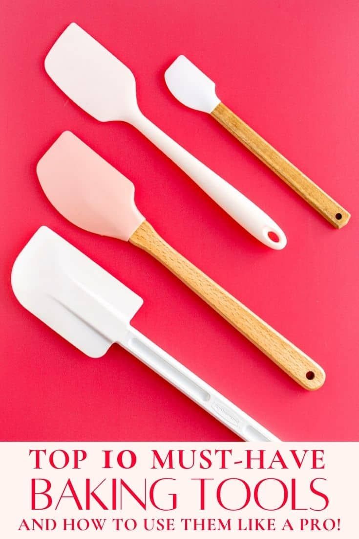 Four silicone spatulas with white or light pink heads and wood or white handles against a solid red background.