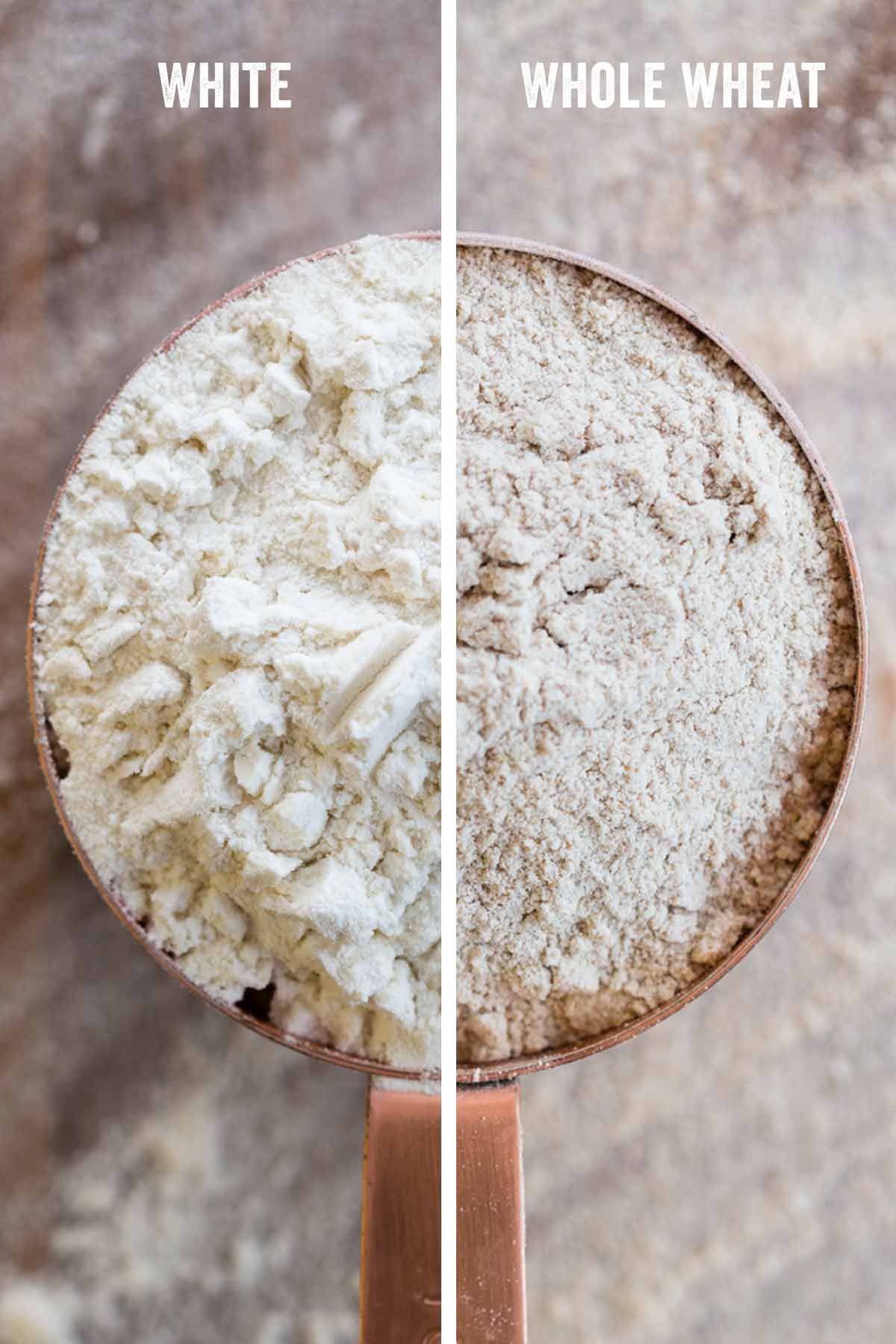 Measuring cup filled with white flour next to a measuring cup filled with whole wheat flour