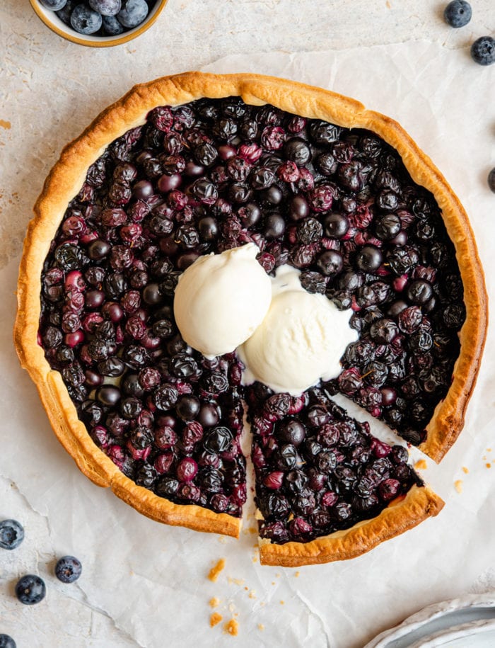 Blueberry tart with a golden crust and glossy blueberry filling.