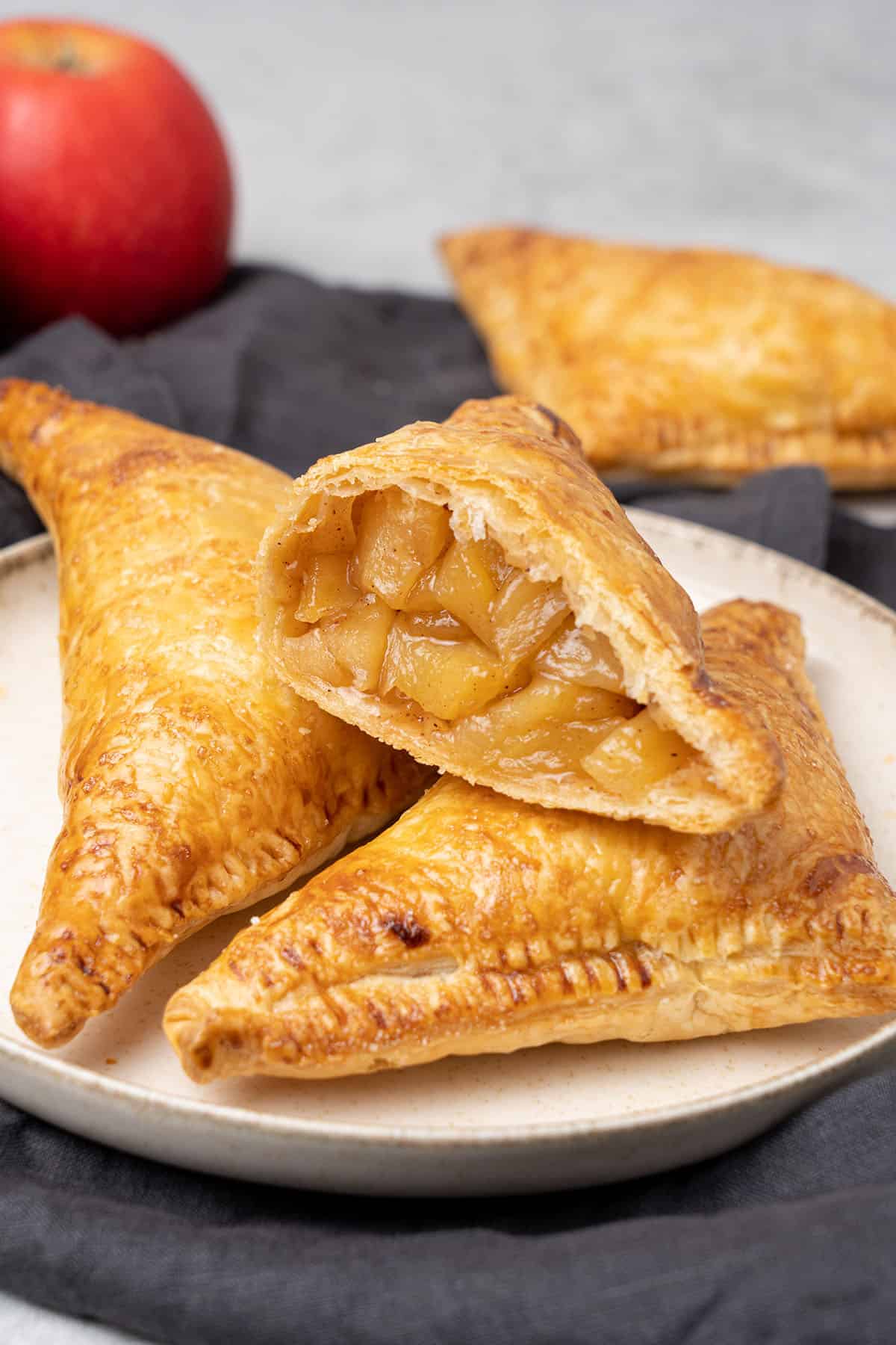 Golden puff pastry apple turnover on a plate